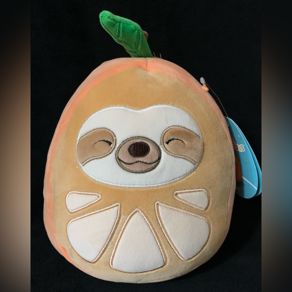 Squishmallows Simon the Sloth in an orange 9” NWT